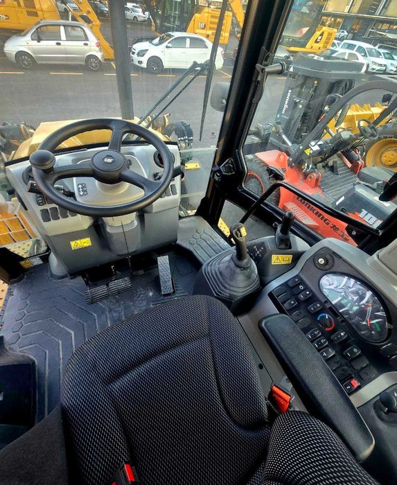 Экскаватор юкловчи CAT432, Экскаватор погрузчик CAT432