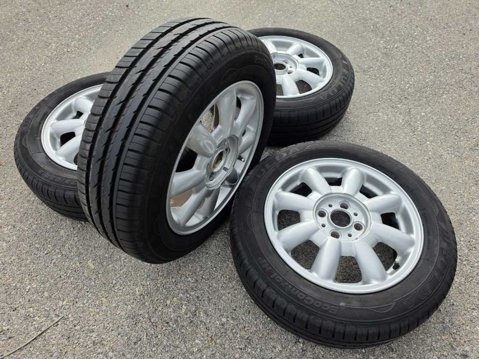 4 бр. Летни гуми 175/65 R15 с алуминиеви джанти 4x100 Mini