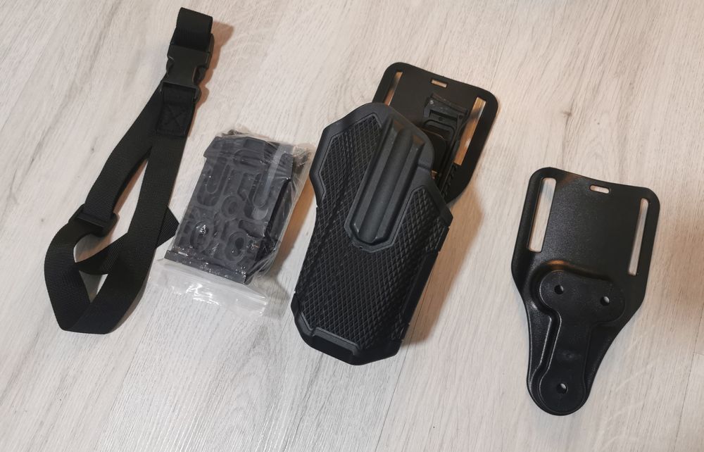 Holster universal cu acțiune rapida universal+platforma.