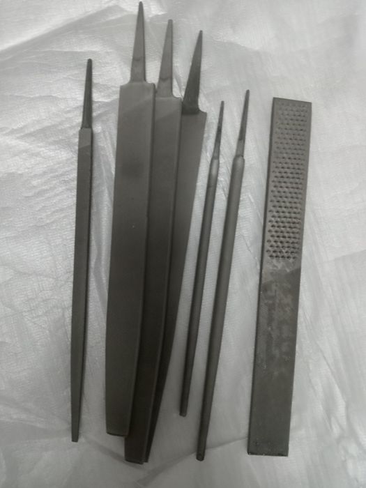 Напильники новые.