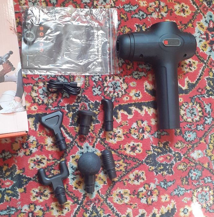 Массажерный пистолет