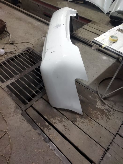 Задний бампер Toyota Camry в оригинале