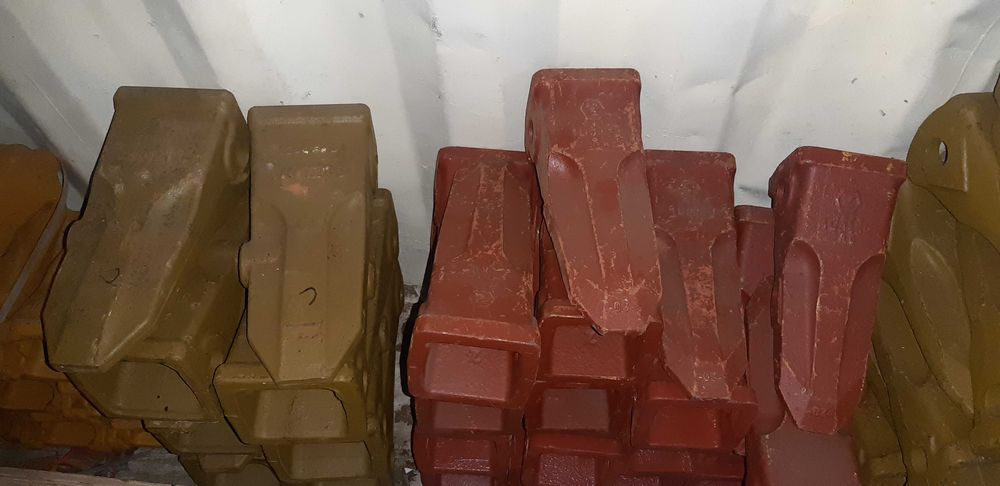 Режущие элементы ковша (коронки адаптера бокорезы)