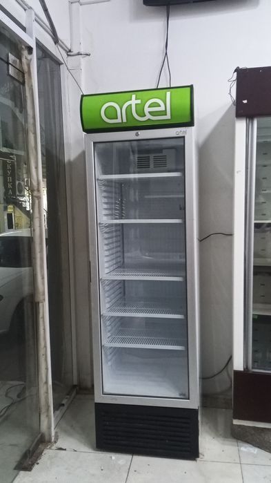 Стоящий холодильник артел