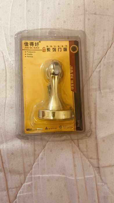 Фиксатор, стопор двери напольный. Ограничитель для дверей