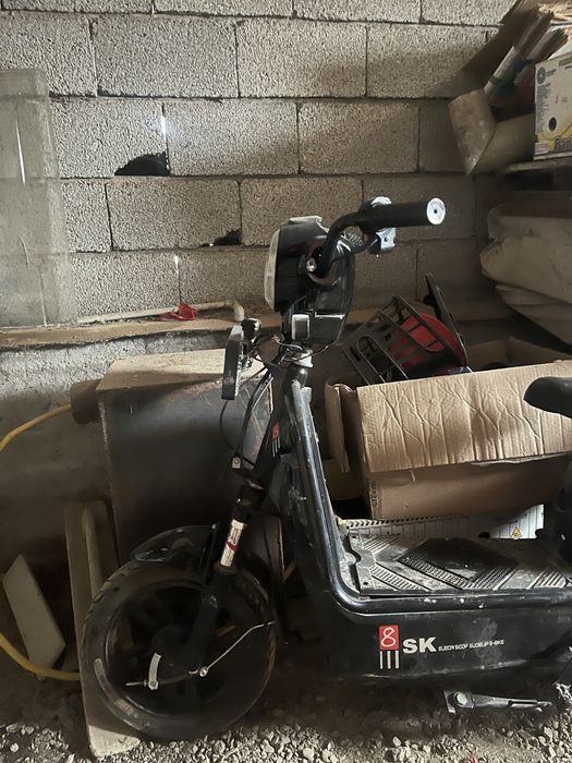 Электроный скутер