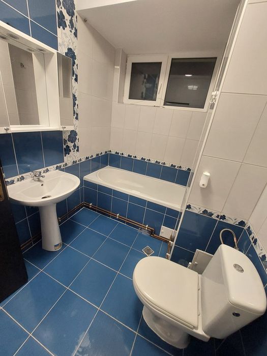 Apartament+două garaje de vanzare