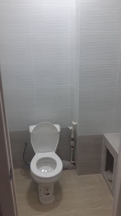 Санат-саройи олдида Янги курилган Дом.