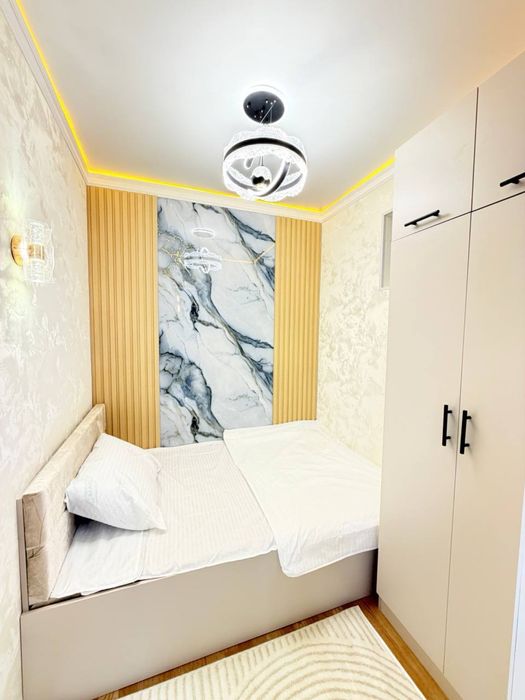 Чиланзар 9.  1в2ком/1этаж. Балкон 2х6.   42м2