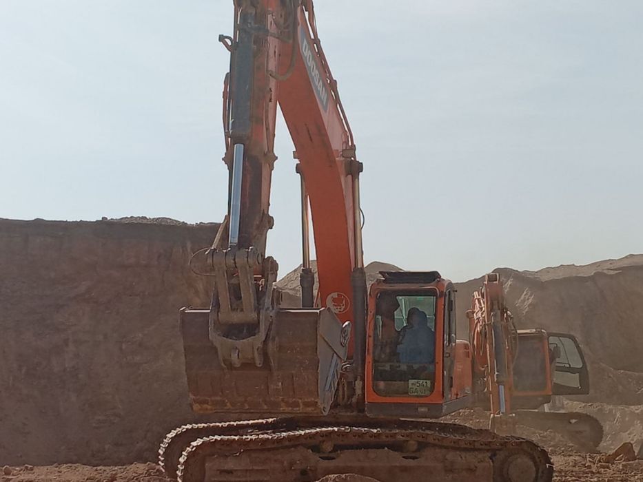 Услуга экскаватор и самасвалов