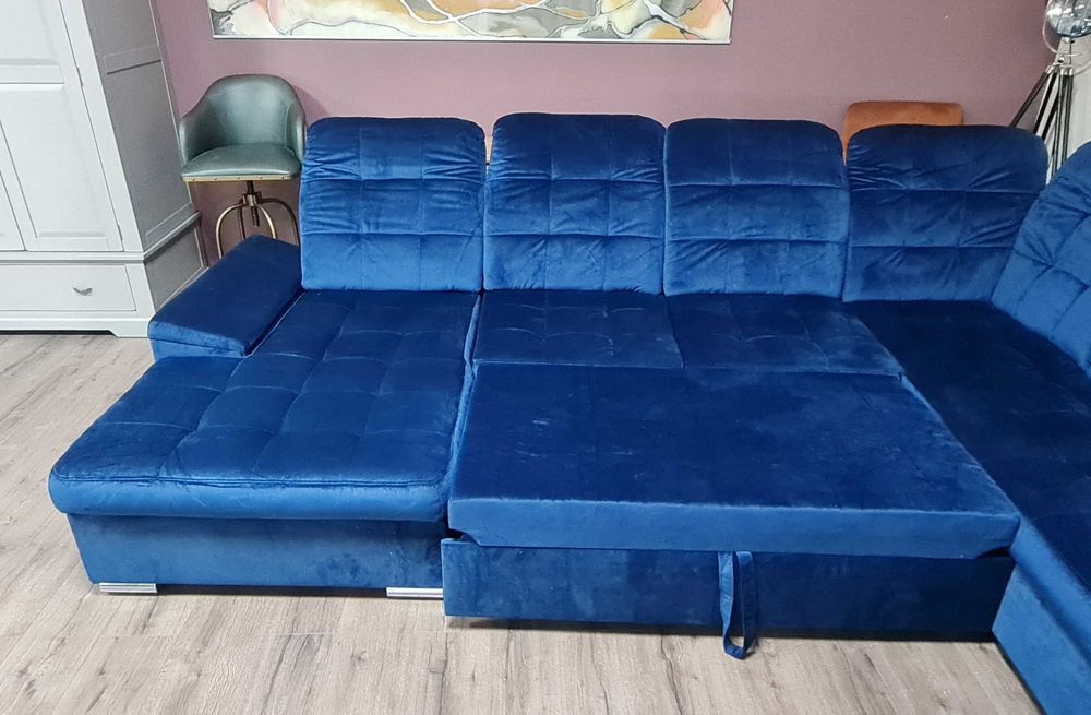 Син П образен ъглов диван от плат Nigrum с функция сън