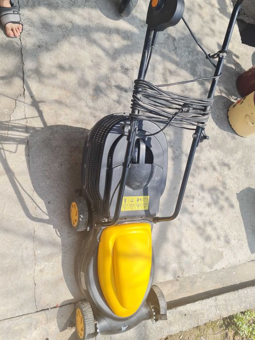 Газонокосилка в хорошем состоянии