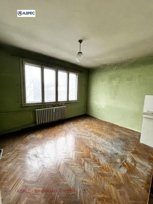 Продава се Тристаен апартамент в Плевен, Идеален център - 91 кв.м за 645 €/кв.м - Снимка #2