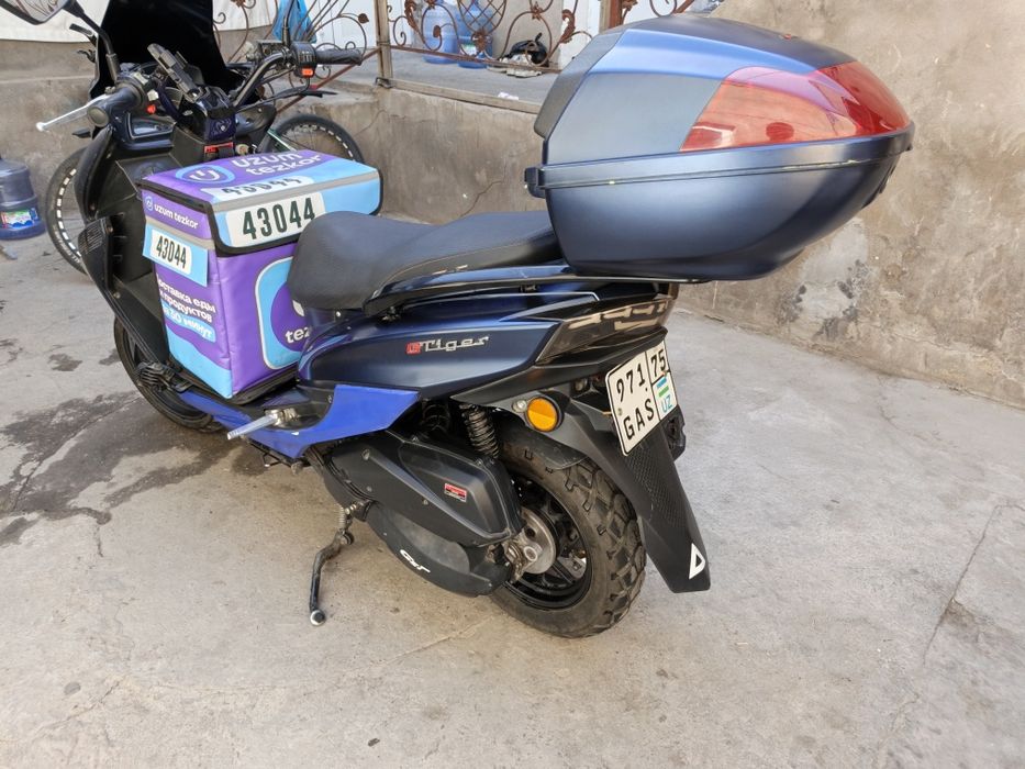 Tiger benzinli sukuter sotiladi . Gst mator holati ideal