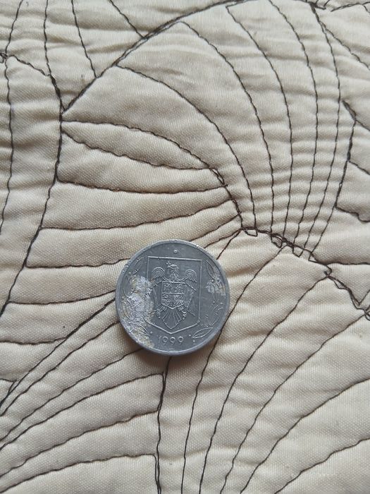Vând monedă de 500lei din 1999