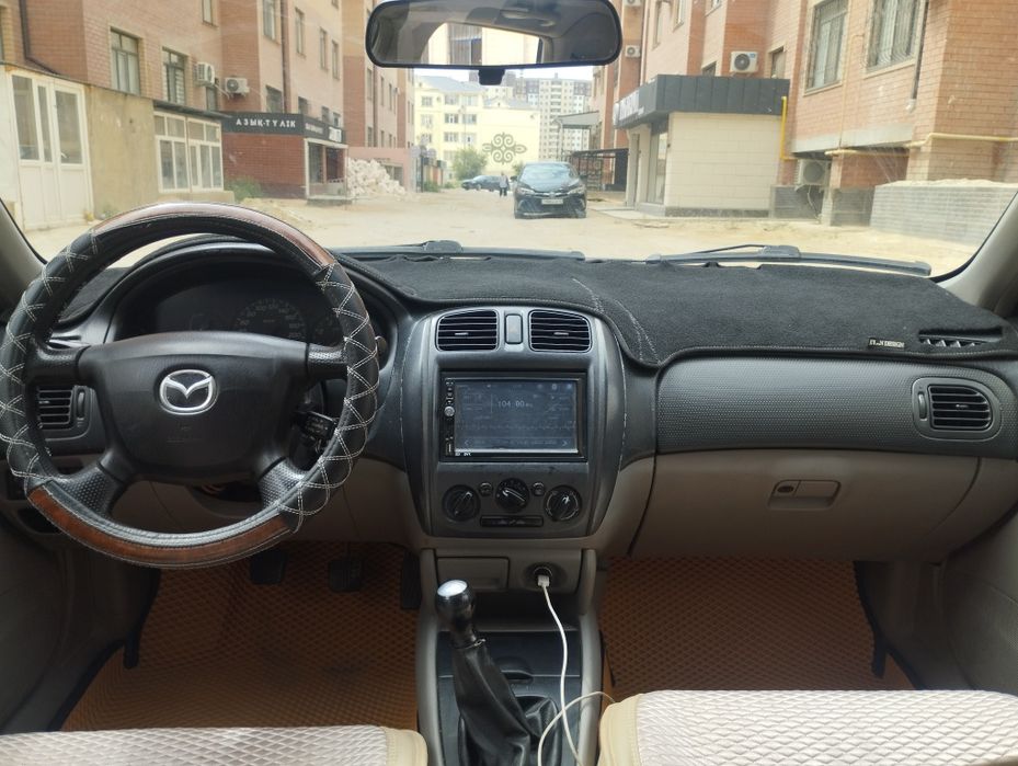 Мазда 323 bj ...