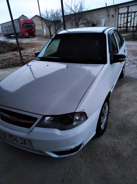 Нексия 2 . Г.2012. белый. Метан. Люкс кондиционер. Бухоро Вобкент