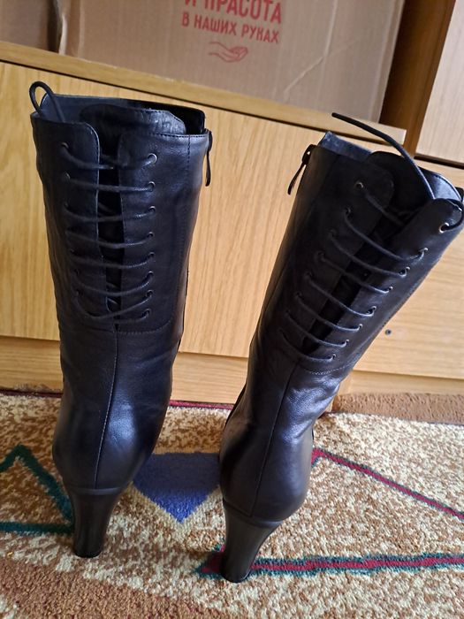 Продам новые кожаные зимние сапоги