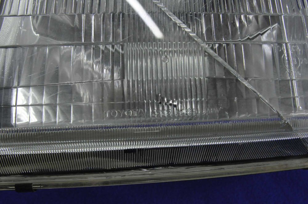 фара Toyota Land Cruiser 100 Левая