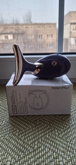 Массажёр для лица.