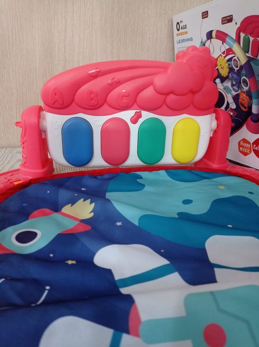 Музыкальный коврик и развивающая дуга