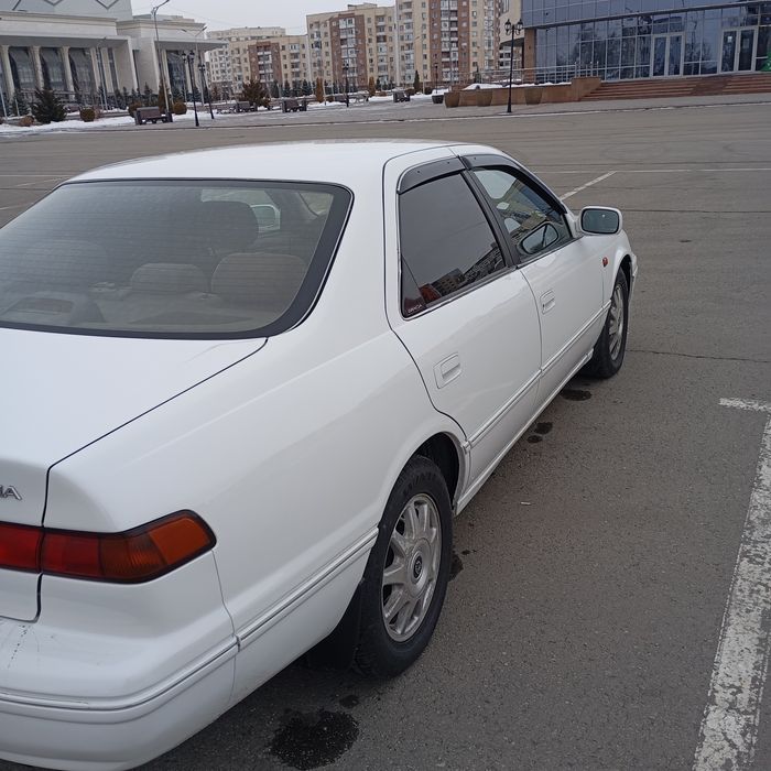 Тайота камрй грация