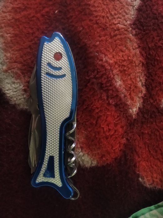 Мултитул виде рыбы