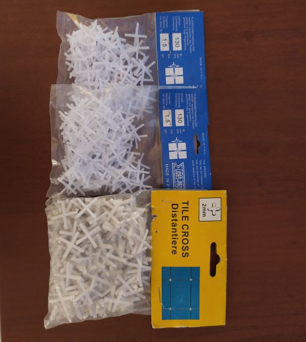 Розетки,выключатели крестики для плитки