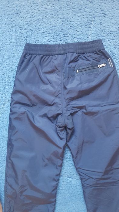 Штаны комбинезоны теплые.