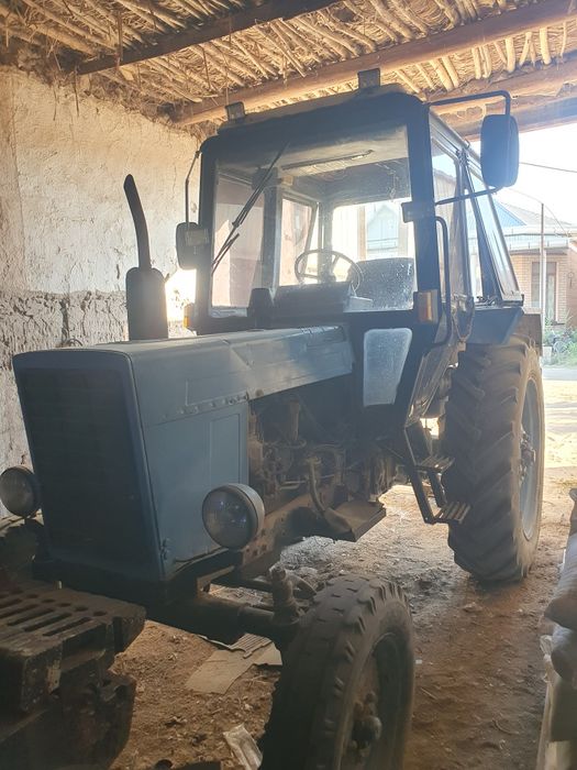 MTZ 80.1 lazerni yer tekislagichi bilan