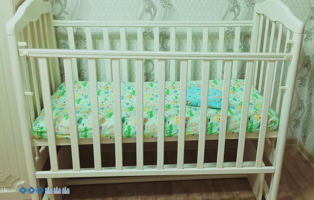 Детская кроватка маятник