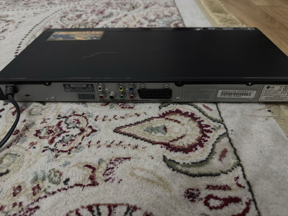 DVD-проигрыватель LG DVX583K с караоке и USB