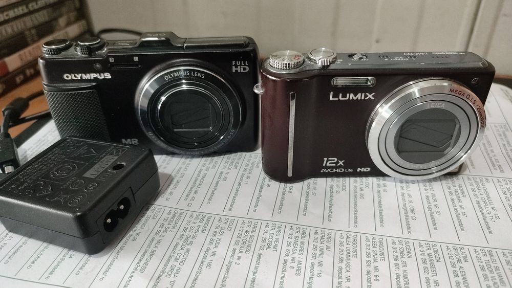 Camere foto Olympus si Panasonic