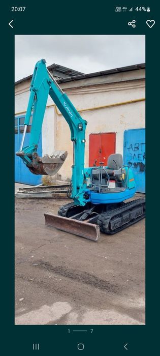 Мини экскаватор   на резиновом  ходу