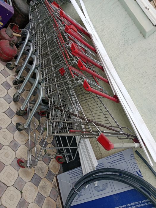 Тележка магазинная