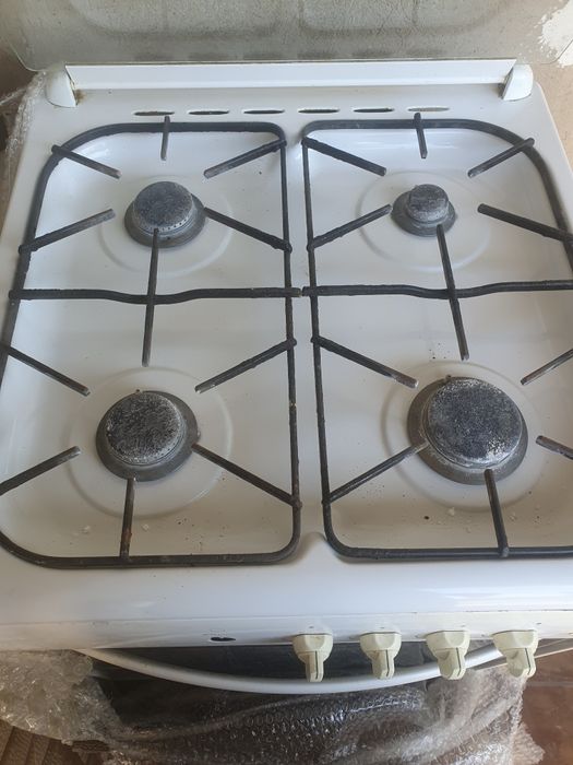 Газовая плита                                                        .