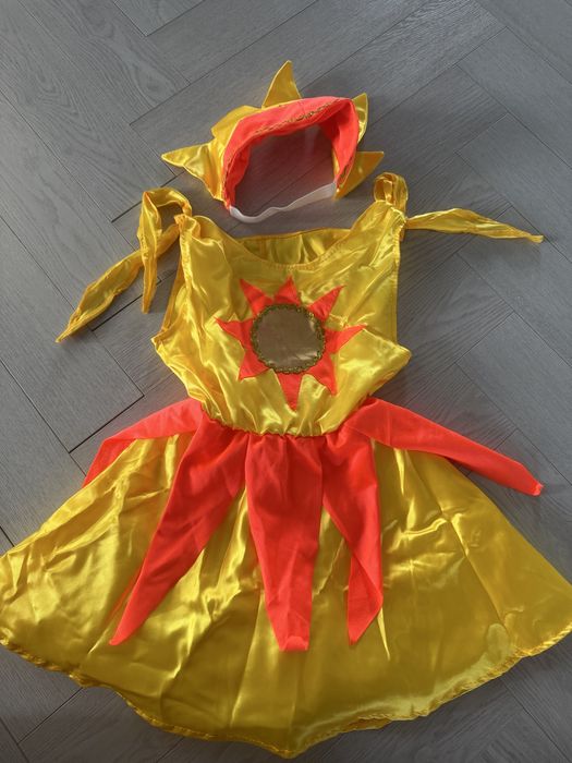 Күн бейнесінде көйлек, солнышко