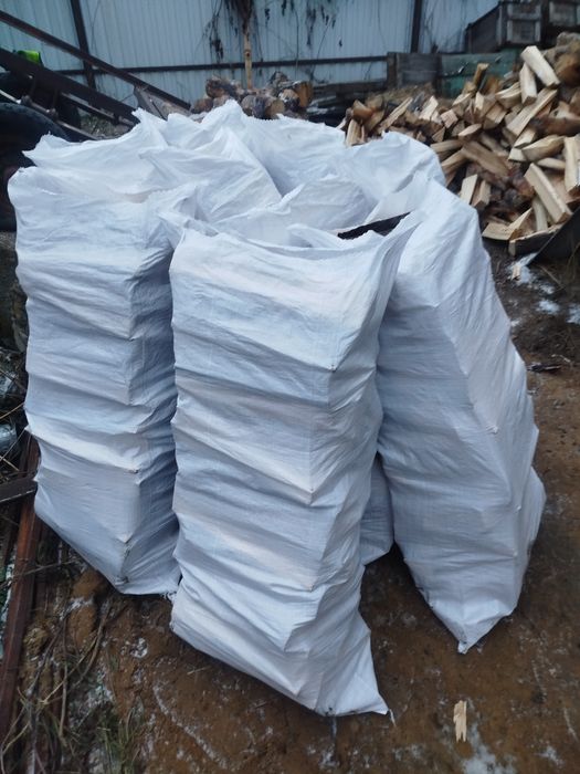 Продам сосна колотая сухая в мешках