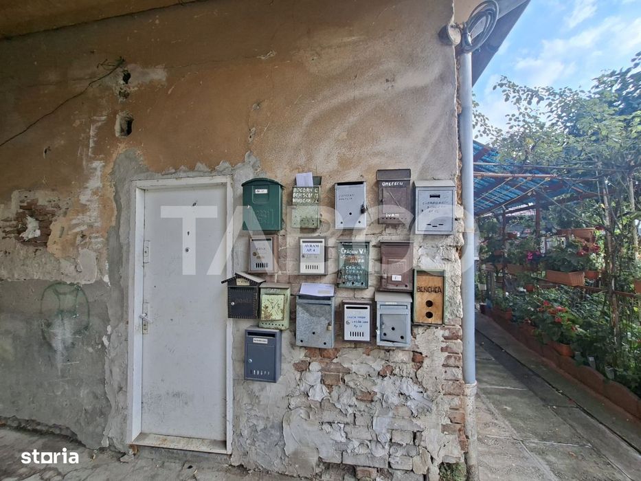 Garsoniera de vanzare aproape de centru cu bucatarie separata