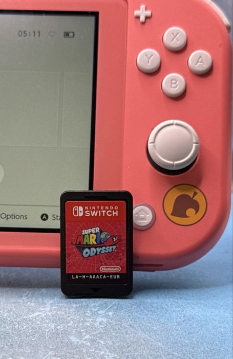 Nintendo Switch Lite (Animal Crossing Edition) + Super Mario Odyssey