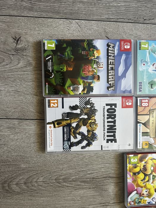 Nintendo Switch OLED (Пълен комплект) + Pro Контролер + 10 Игри + Калъф
