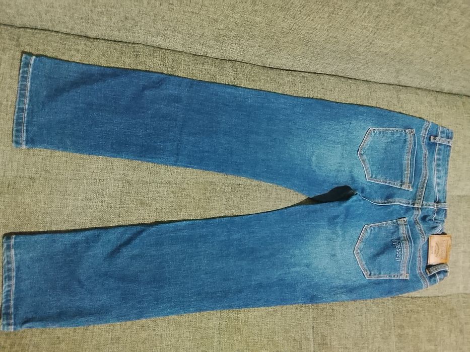 Джинсы фирменные на 8-10 лет.