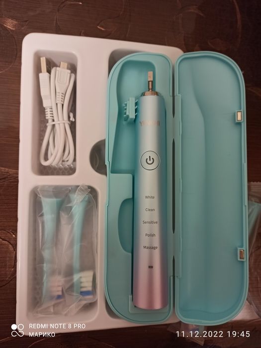 Электрическая зубная щётка