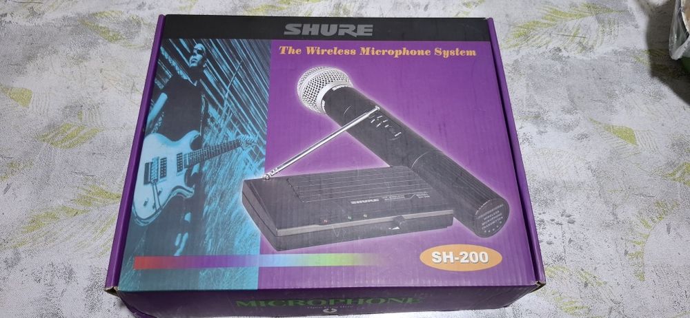 Продам микрофон с усилителем.