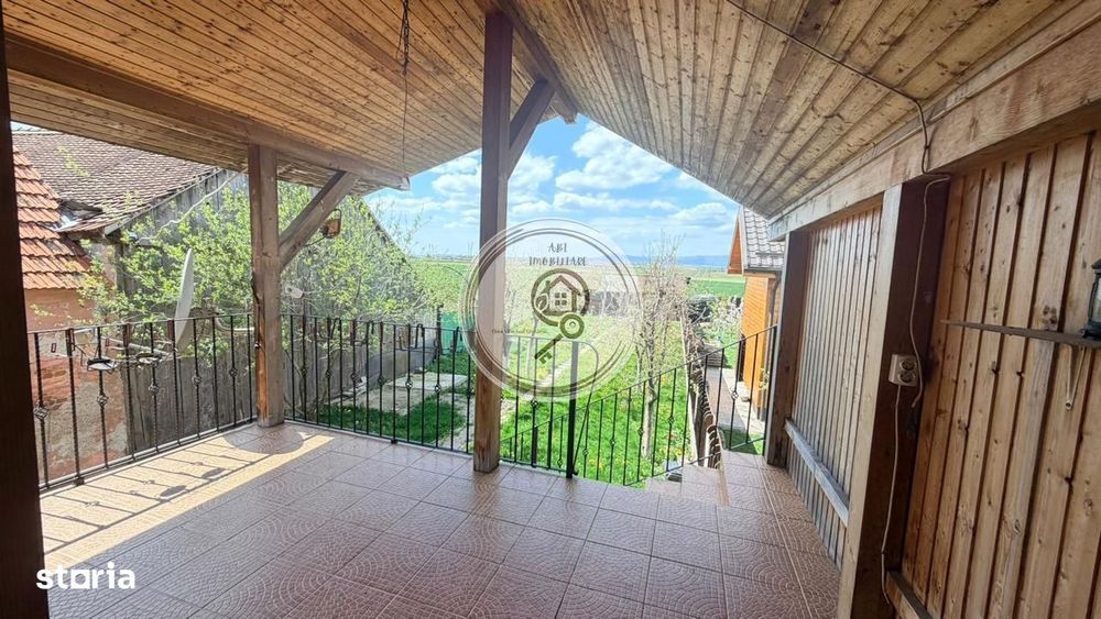 Casă spațioasă cu mansardă, 2 terase& curte – Hălchiu, Str. Bisericii