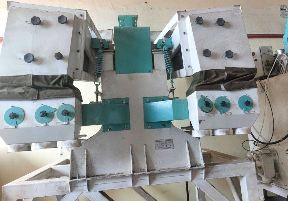 Машина за белене на ориз