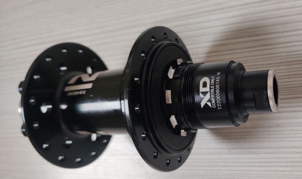 Задна главина Novatec 12/148мм. Нова.