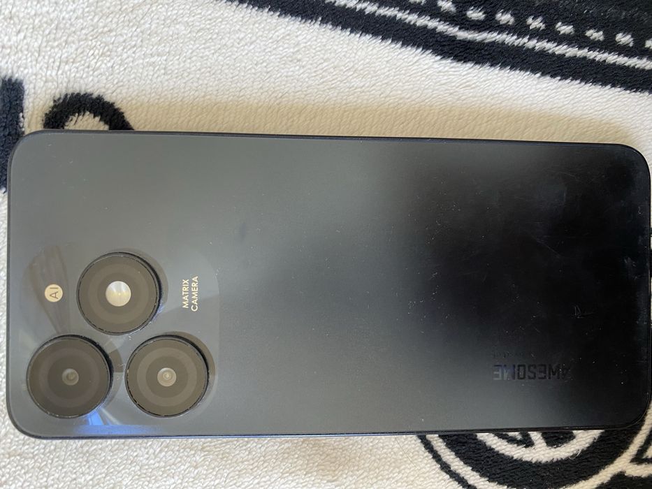 Tecno Spark Go телефон