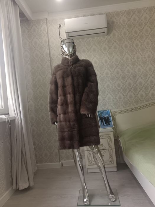 Шубы норка разные