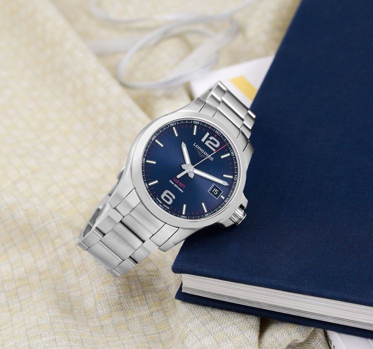 Швейцарские часы фирмы Longines Conquest V.H.P., кварц